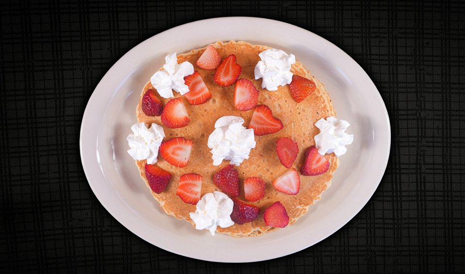 Comfort food served in a cozy diner setting.